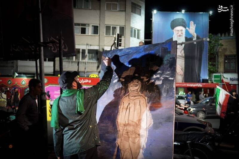 عکس/ "خلق اثر "آقای کشوردوست" در مقابل خیابان کشوردوست
