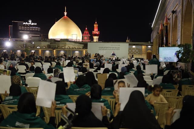Families of Minab’s martyred students honored at Imam Ali (AS) Shrine 