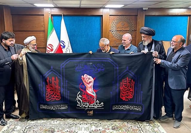 رونمایی از شعار و پوستر اربعین 1405 در ستاد مرکزی اربعین