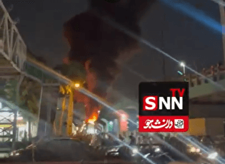 آتش‌سوزی یک انبار در نزدیکی پل ری تهران / حضور پرشمار آتش نشانان در محل حادثه+ فیلم